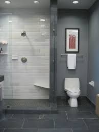 Gray slate bathroom tile is used to decorate the floor and walls of the space. Slate Tile Bathroom Floor Slate Bathroom Tile Grey Flooring Small Bathroom Remodel