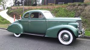 Image result for Mansion Maroon 1938 Oldsmobile