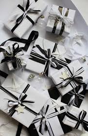 Black And White Christmas Wrapping Paper This Year S Christmas Wrapping Theme Is All Out Monochrome Black And White Ribbon Monochrome Twine And A Gifts Christmas Present Wrap Christmas Gift Wrapping