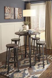 How To Make An Interesting Art Piece Using Tree Branches Ehow Round Pub Table Round Dining Room Dining Room Bar