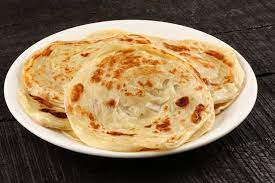 Learn How To Make Flaky Parathas For Your Indian Dishes Indian Bread Recipes Paratha Recipes Recipes