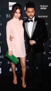 Selena gomez wears the weeknd's necklace as they step out holding hands. Selena Gomez Goes From Red Carpet Glam To After Party Cool In Less Than 24 Hours Vogue