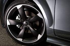 The Audi Tt Coupe S Line Competition Package Features Imposing 19 Inch Wheels In A Five Arm Rotor Design Painted Black And Shod With Audi Tt Audi Black Audi