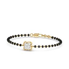 The adwitiya mangalsutra bracelet, the akhila mangalsutra bracelet and the aarohee mangalsutra bracelet defines trendy geometric design along with the true values of mangalsutra. The Skarkling Cluster Diamond Mangalsutra Bracelet By Pc Jeweller
