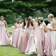 An Angelic Group Of Bridesmaids Rocking The Dessy Group Twist Dresses In Blush Blu Dessy Bridesmaid Dresses Neutral Bridesmaid Dresses Wrap Dress Bridesmaid