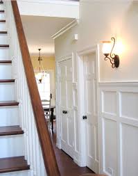 Satin Nickel Vs Oil Rubbed Bronze How To Nest For Less White Wainscoting Wainscoting Stairs Wainscoting Styles