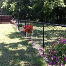 Landscaping to hide chain link fence. Fence Decorations Fence Deck Supply