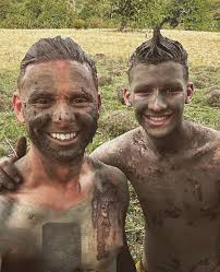Jeff Brazier and son Freddie enjoy a mud bath following Bobby's NTA win