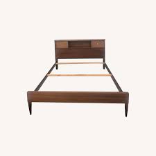 Some bed frames with headboards offer functionalities as well, helping your bedtime become more comfortable the bed stands at a height of 14 inches and offers some storage space underneath. Mcm Full Bed Frame With Storage Headboard Aptdeco