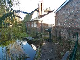 sluices above ford mill robin webster cc by sa 2 0