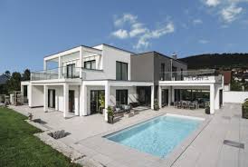 Moderne häuser sind einfach und dienen als. Moderne Bauhaus Villa Mit Flachdach Und Garage Hausbaudirekt De