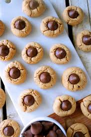 Chocolate packed hershey kiss cookies are rolled in sugar & baked with a hershey's kiss in the middle. Thumbprint Hershey Kiss Cookies Recipe The Anthony Kitchen