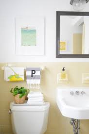 Together, they beat a perfect balance and fit a variety of decorating styles. Bathroom Yellow Tile