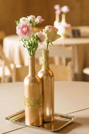 Pint ball mason jars, quart ball mason jars and clear glass milk bottles with lids make great unconventional flower vases that really fit with. Brittany Jd S Rustic Tennessee Farm Wedding At Jon Haven Farm Mid South Bride Wedding Wine Bottles Wedding Bottles Wedding Centerpieces Diy Rustic