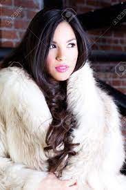 German shepherds with longer coats are no different than a normal coated german shepherd in any way, other than the length of the coat. Beautiful Young Woman With Long Hair Wearing A Faux Fur Coat Stock Photo Picture And Royalty Free Image Image 14285644