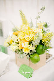We specialize in a soft, romantic, and thoroughly modern style of floristry, focussed on delivering beautiful color, texture and interest. Green Yellow Flowers At Cream Event Nyc Yellow Centerpieces Wedding Flowers Flower Arrangements