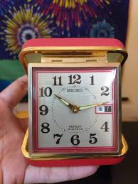 Seiko 'bedside' plastic alarm clock, color:black (model: Seiko Pocket Travel Windup Alarm Clock Vintage Antique Leather Box Japan Repeat 2 Jewels Movement Women S Fashion Jewelry Organizers Precious Stones On Carousell