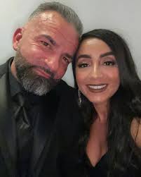 My hubby & I celebrating the newlyweds. Congratulations to Nicole & Erick  Cuellar! Wishing you two nothing but success & happiness cheers to forever!  This December wedding was so beautiful. 🫶🏽🙌🏽 @nferrantixo @