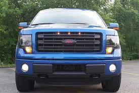 3x amber led lights and wiring harness connector. 2013 2014 Ford F150 Raptor Style Grille Light Kit Clear Lens Amber Led