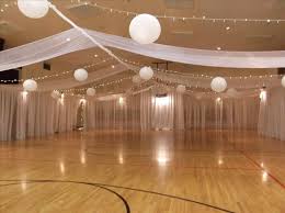 Simple Draping Of Lights And Linens Incorporating The Lanterns Too Wedding Reception Rooms Diy Wedding Decorations Wedding Reception Decorations