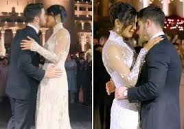 Priyanka Chopra And Nick Jonas Who Had A Dream Wedding In Jodhpur Had Their First Kiss And Dance Against The Backd Christian Wedding First Dance Photos Wedding