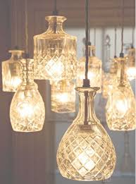 Ever thought about making your own diy pendant light? Put A Bulb In It 24 Upcycled Pendant Lights Made From Thrifty Vintage Treasures Diy Pendant Light Diy Light Fixtures Decanter Lights
