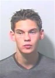 Rugby club killer back behind bars