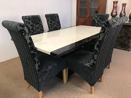 What are the shipping options for black dining room sets? Monaco B W 180cm Marble Dining Table And 6 Black Tall Scrollback Chairs Designer Marble