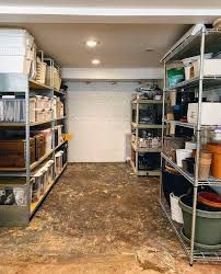 When he had all of the shelves put together, we began building the shelving unit in our basement. Our Clean Organized And Practical Unfinished Basement Project Palermo