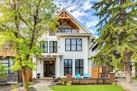 Calgary Home Radiates With Fresh Modern Farmhouse Style Modern Farmhouse Exterior House Exterior Farmhouse Exterior