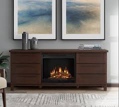 Redefine one or many of your favorite spaces with a gorgeous electric fireplace. Real Flame 67 Parsons Electric Fireplace Media Cabinet Fireplace Entertainment Electric Fireplace Fireplace Entertainment Center