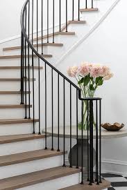 Balcony balusters and panels, stair balusters, spindles, and shoes, hand forged steel newel posts, designer series panels such as regency, tuscan, rococo, and nouveau. Wrought Iron Spindles On Winding Staircase Transitional Entrance Foyer