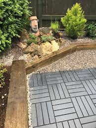 Installing the ikea patio deck tiles. Rockery In Our Small Garden Using Ikea Runnen Decking And Wooden Railway Sleepers Garden Floor Small Garden Ikea Garden Decking