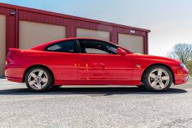 Image result for Victory Red 2004 Pontiac