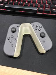 It has rails on each. 3d Printed Nintendo Switch Controller Holder Album On Imgur