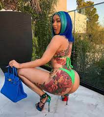 Jun 17, 2019 · cardi b suffered a major wardrobe malfunction on stage at bonnaroo arts and music festival. Cardi B S Tattoos Photos And Meanings All Of Cardi S Tats