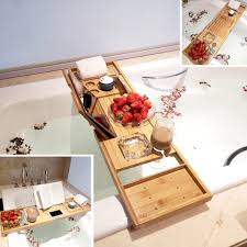 The bamboo bathtub tray, caddy wooden bath tray, table with extending sides, reading rack, tablet holder, a cell phone tray, and wine glass holder. Bamboo Bathtub Tray Bathtub Tray Spa Bathtub Caddy Organizer Book Wine Holder Reading Rack Nonslip Bottom Extendable Bathtub Trays Aliexpress