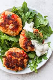 In a large mixing bowl stir together 1/4 cup panko bread crumbs, parsley, green onions, garlic, mayonnaise, lemon zest, dijon mustard, old bay seasoning, egg yolk, 1/2 tsp salt (or to taste) and 1/4 tsp pepper. Simple Salmon Patties Recipe How To Make Salmon Patties Fit Foodie Finds