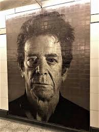 NYC subway system, artist Chuck Close paints a portrait of singer Lou Reed.  ❤️