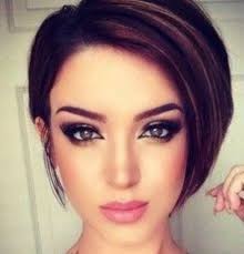 If you've got natural waves/curls in your hair, this short hairstyle will look great. Love The One Side Longer Than The Other Look Hair Styles Short Hair Styles Hair Makeup