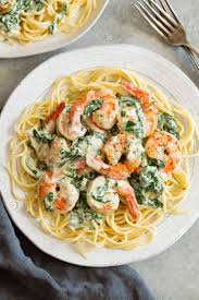 Added shrimp last just before sauce thickened. Creamy Parmesan And Spinach Shrimp Cooking Classy