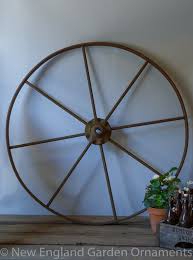 Give a rustic touch to your garden with this wooden wagon wheel trellis from birch lane. Antique Wagon Wheels Large New England Garden Company