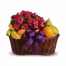Wide selection of floral arrangements. Blooms And Fruit Gift Basket At Send Flowers