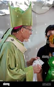 Archbishop John Wester of the Archdiocese of Santa Fe welcomes visitors to  the annual Spanish Market in Santa Fe, New Mexico Stock Photo