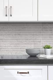 You can tweak and install hardwoods as your backsplash kitchen to make a minimalist yet modern look. Modern Light Gray Subway Backsplash Tile Contemporary Design Backsplash Kitchen White Cabinets Tile Backsplash Kitchen Tiles
