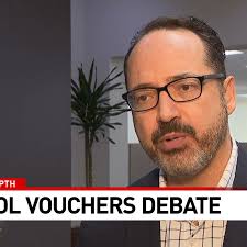 Is it school choice or voucher program? And how would it work in Texas?