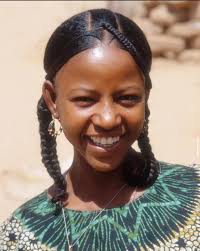 Isn't she beautiful. What do they call this style of hairdo? Now you know.  Greg Nwoko