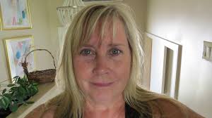 What time should we arrive at the airport for a domestic flight from GHB to  Nassau?