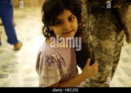 U.S. Army Staff Sgt. Manuel Salais, Iron Training Detachment Senior Air  Assault instructor and Cpl. Alexandra Perez, Iron Training Detachment Air  Assault instructor, perform inverted rappel techniques while U.S. Air Force  Master
