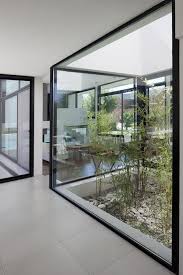 20 Beautiful Indoor Courtyard Gardens Home Design And Interior Courtyard Design Indoor Courtyard Patio Interior